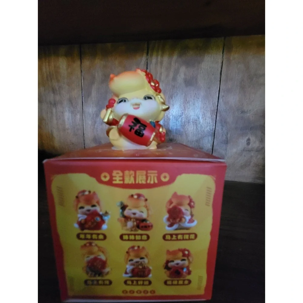 Chinese Collectible Figure with Red Drum, Lantern, Decorative Box